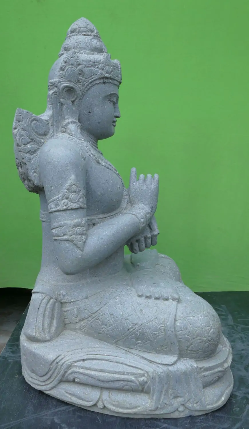  Product image 7 of the product “Seated Dewi Sri made of Riverstone in Dharmachakra gesture of wheel of the teaching of the Dharma, H. 80cm. ”
